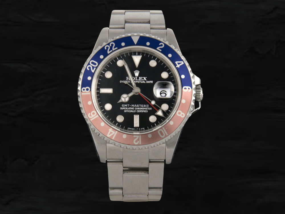 Rolex GMT-Mster II 16710 bisel Pepsi que ha perdido el color.