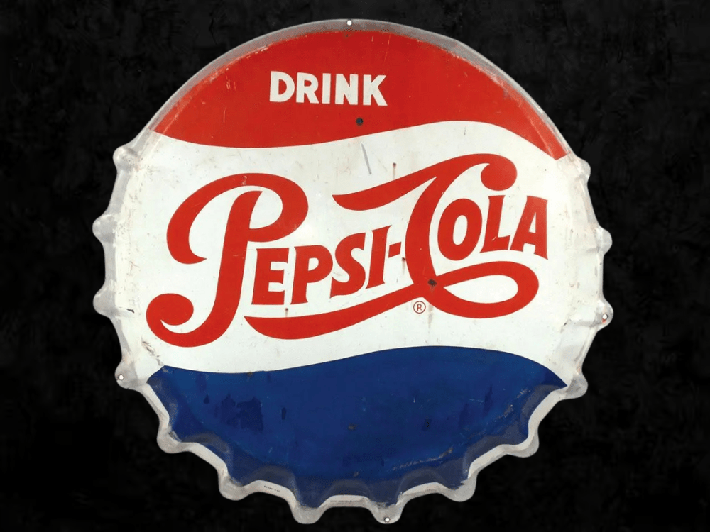 Chapa de Pepsi de 1954 que dio el apodo al Rolex GMT Pepsi.