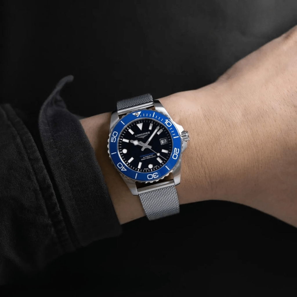 Longines Hydroconquest L3.779.4.90.6 acero 39mm milanesa bisel azul