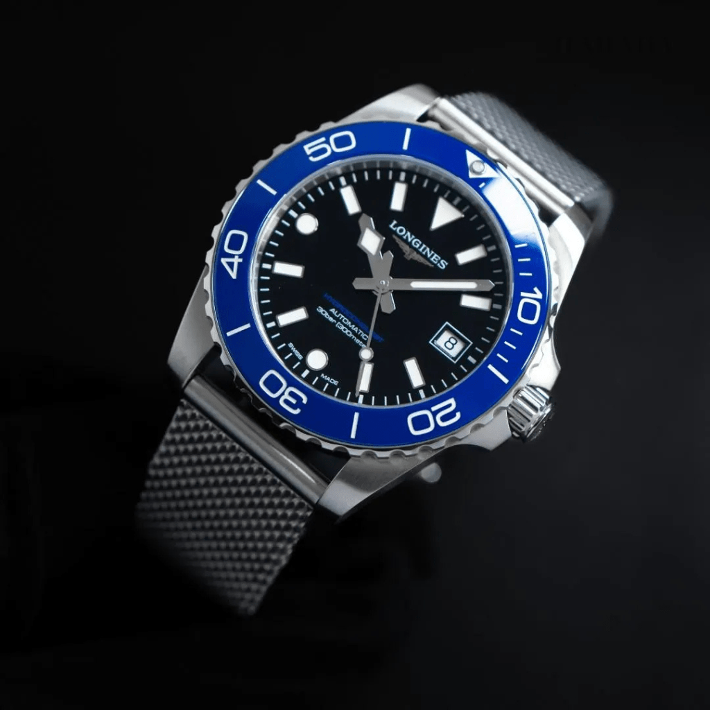 Longines Hydroconquest 42mm L3.788.4.90.6 acero, esfera negra, bisel cerámico azul brazalete milanesa