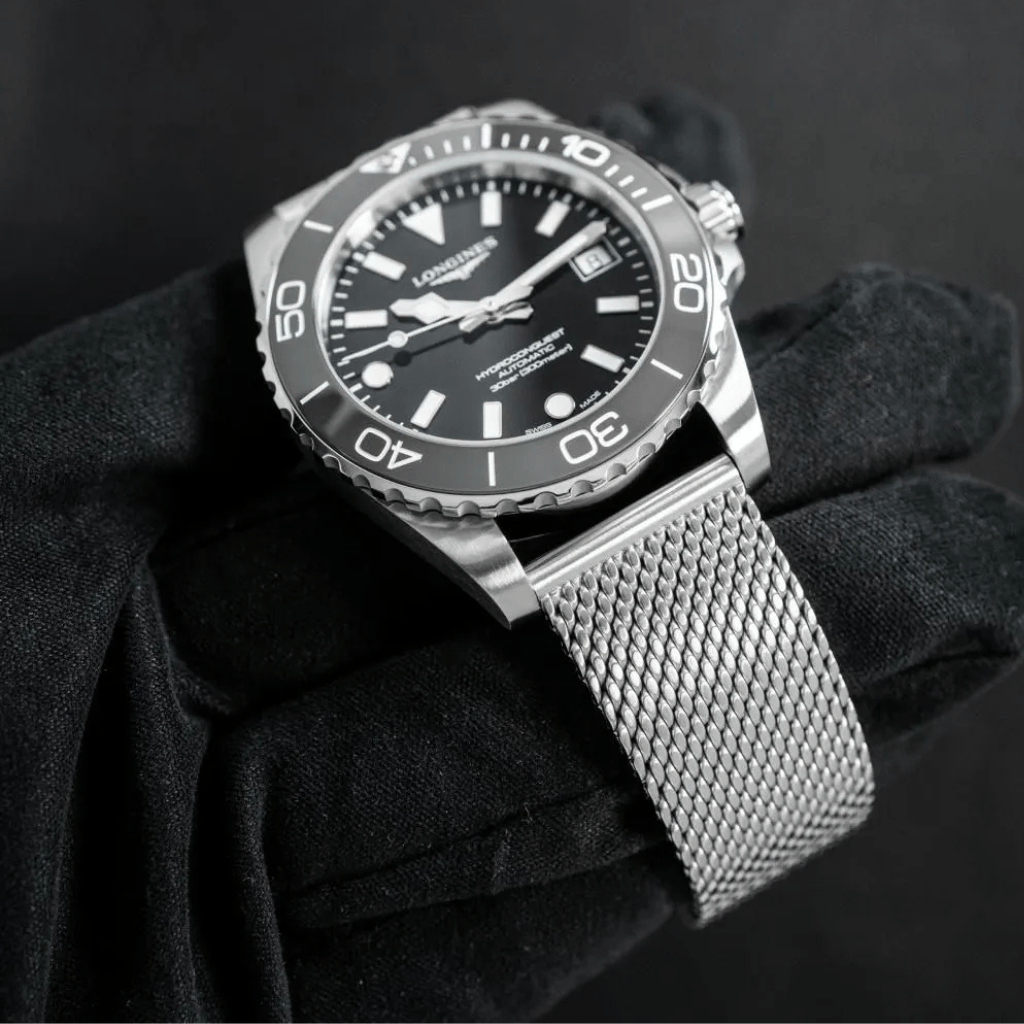 Longines Hydroconquest 42mm L3.788.4.70.6 acero, esfera negra, bisel cerámico negro brazalete milanesa