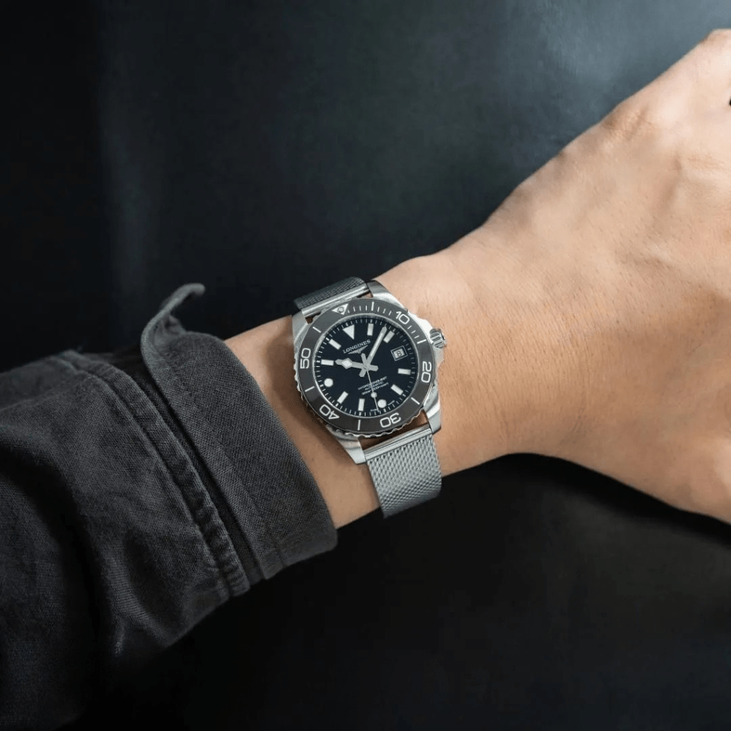 Longines Hydroconquest 42mm L3.788.4.70.6 acero, esfera negra, bisel cerámico negro brazalete milanesa