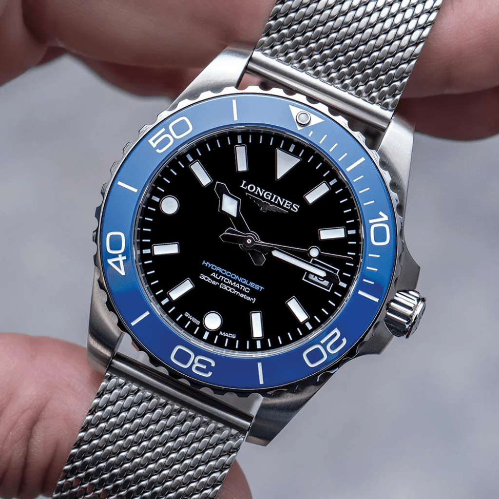 Longines Hydroconquest 42mm L3.788.4.90.6 acero, esfera negra, bisel cerámico azul brazalete milanesa